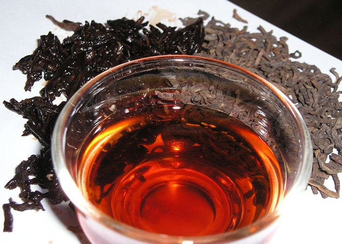 beneficios del te negro con limon y miel